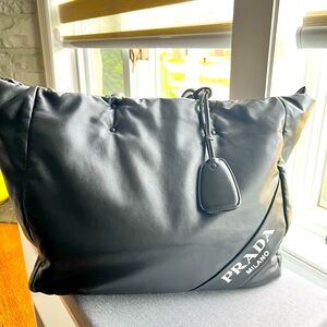 Super cute authentic Prada bag. Large and comfy.Signs of wear as on the pictures